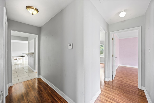 4535 Clermont Ave, Groves, TX 77619 - corridor featuring wood finished floors and baseboards