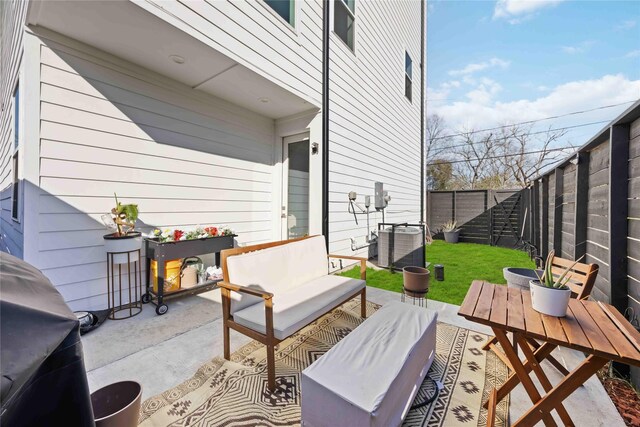2422 Briley St, Houston, TX 77004 - fenced backyard with a patio area and outdoor lounge area