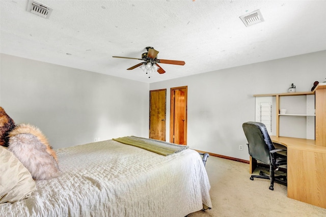 6026 Gnarled Oaks Ct, Humble, TX 77346 - bedroom with carpet flooring, a desk, and a ceiling fan