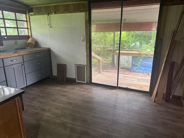 771 Governor Wood Dr, Point Blank, TX 77364 - unfurnished dining area with dark wood-type flooring