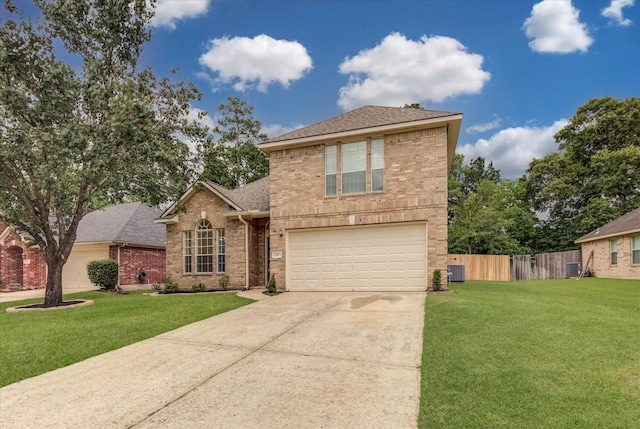 71 N Merryweather Cir, Conroe, TX 77384 - traditional-style house featuring an attached garage, brick siding, driveway, and a shingled roof