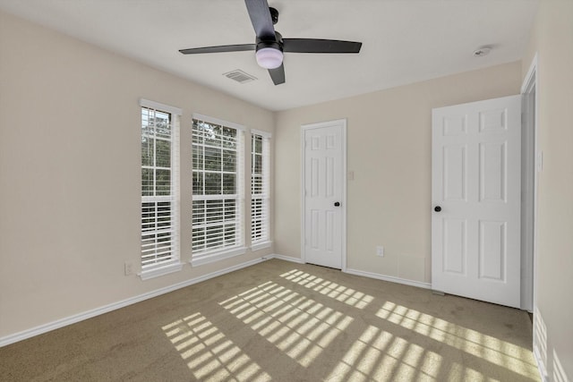 71 N Merryweather Cir, Conroe, TX 77384 - unfurnished bedroom with carpet flooring and ceiling fan