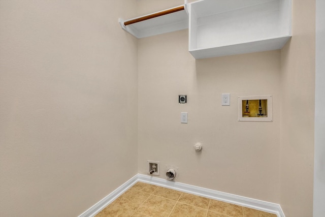 71 N Merryweather Cir, Conroe, TX 77384 - laundry area with hookup for a gas dryer, hookup for an electric dryer, washer hookup, and light tile patterned flooring