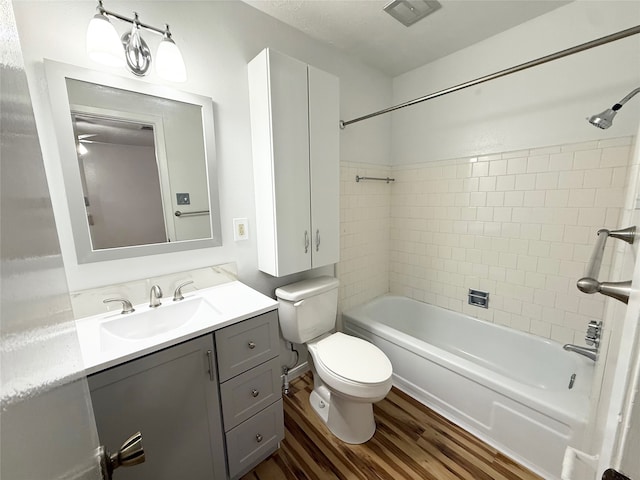 7040 Jetty Ln, Houston, TX 77072 - bathroom with vanity,  shower combination, and wood finished floors