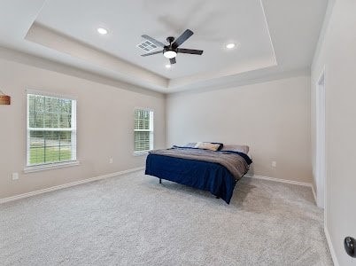 10462 Shepard Hill Rd, Willis, TX 77318 - bedroom featuring a tray ceiling, carpet floors, recessed lighting, and ceiling fan