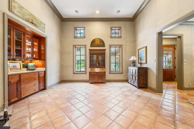 603 W Friar Tuck Ln, Houston, TX 77024 - foyer entrance with a towering ceiling, plenty of natural light, and light tile patterned flooring