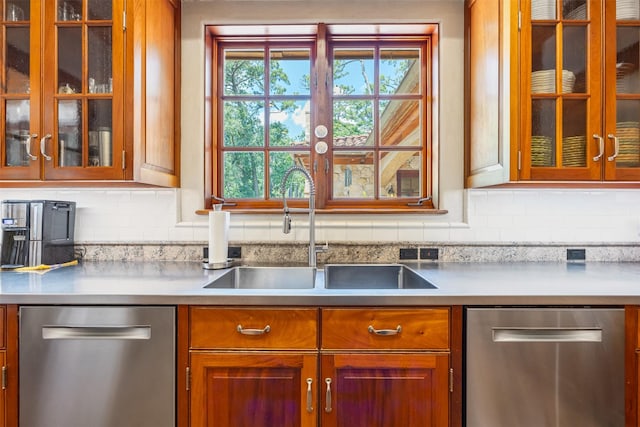 603 W Friar Tuck Ln, Houston, TX 77024 - kitchen featuring dishwasher, decorative backsplash, and brown cabinets