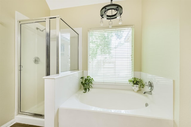 227 Fairwind Trail Dr, The Woodlands, TX 77385 - bathroom with a stall shower and a garden tub