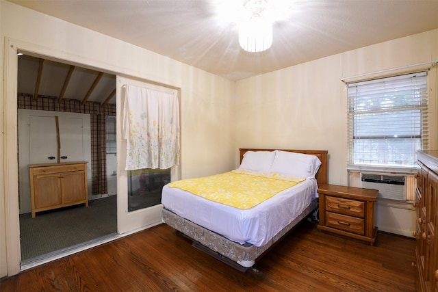 3614 Billingsley St, Houston, TX 77009 - bedroom with dark wood-style floors, vaulted ceiling, and cooling unit