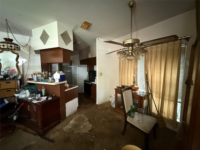12380 Sandpiper Dr Unit 201, Houston, TX 77035 - dining room with a ceiling fan, concrete floors, and lofted ceiling