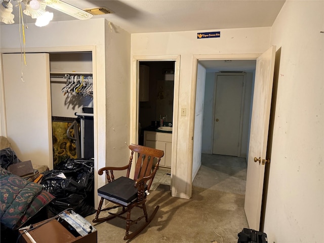12380 Sandpiper Dr Unit 201, Houston, TX 77035 - bedroom with concrete floors, a closet, and a ceiling fan