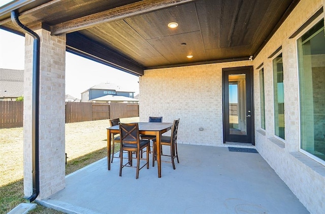 9522 Rialto Creek Dr, Cypress, TX 77433 - fenced backyard with a patio area and outdoor dining space