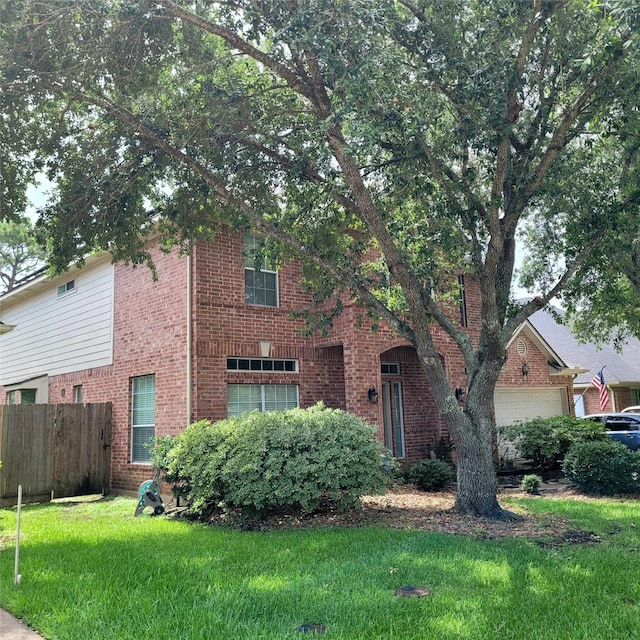 110 Greenridge Cir, League City, TX 77573 - traditional home featuring brick siding and a garage