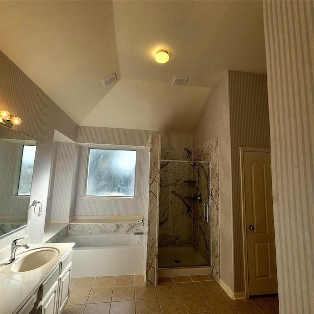 110 Greenridge Cir, League City, TX 77573 - full bathroom with a bath, vanity, a marble finish shower, tile patterned floors, and vaulted ceiling