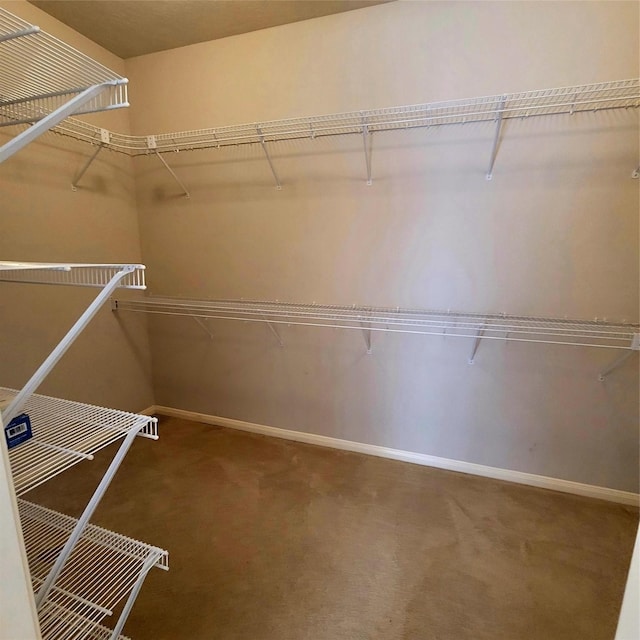 110 Greenridge Cir, League City, TX 77573 - spacious closet featuring carpet flooring