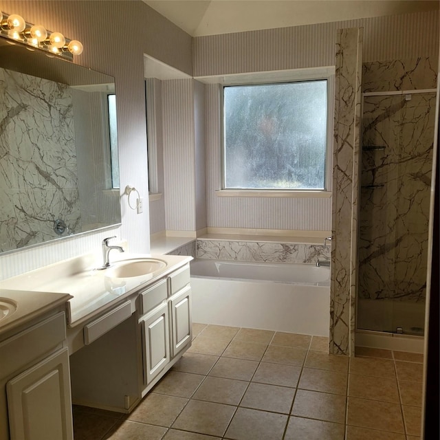 110 Greenridge Cir, League City, TX 77573 - bathroom with wallpapered walls, tile patterned floors, double vanity, a garden tub, and a marble finish shower