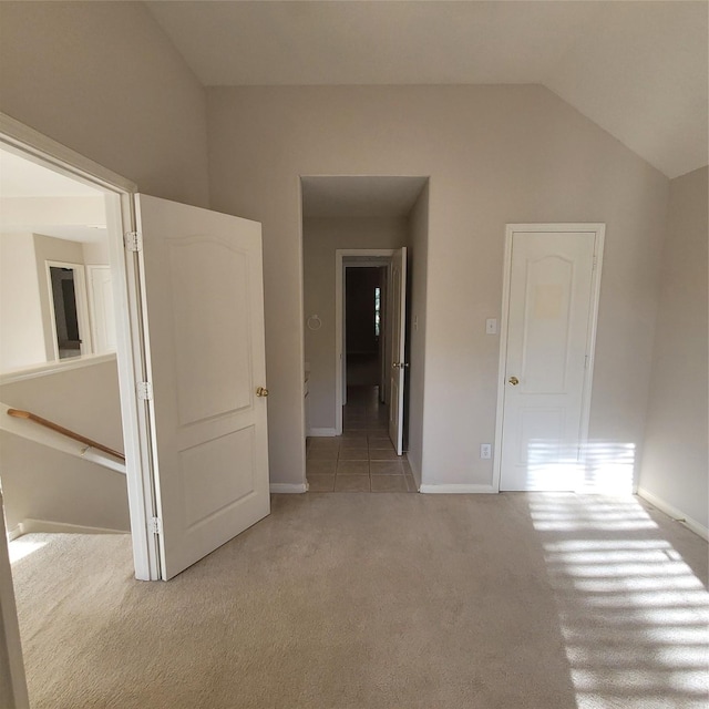 110 Greenridge Cir, League City, TX 77573 - unfurnished bedroom featuring light carpet and lofted ceiling