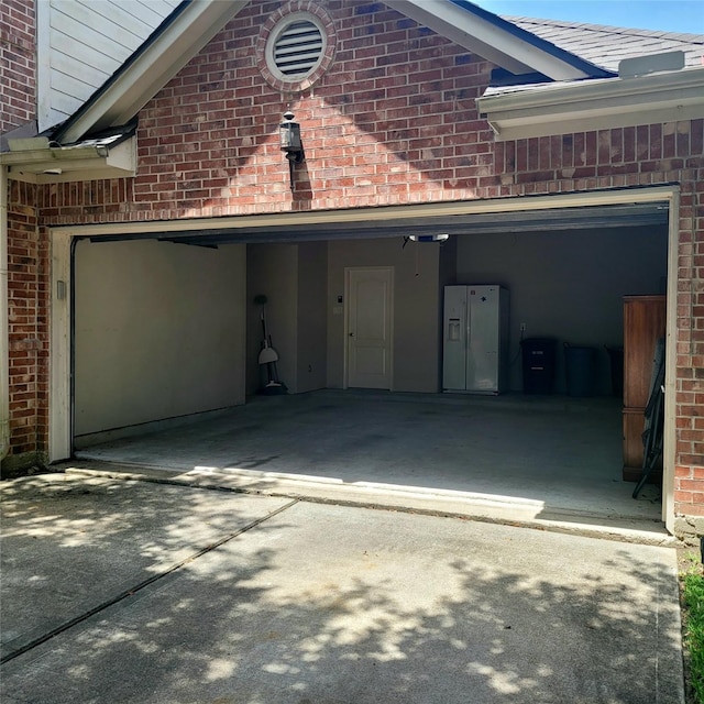 110 Greenridge Cir, League City, TX 77573 - garage featuring concrete driveway