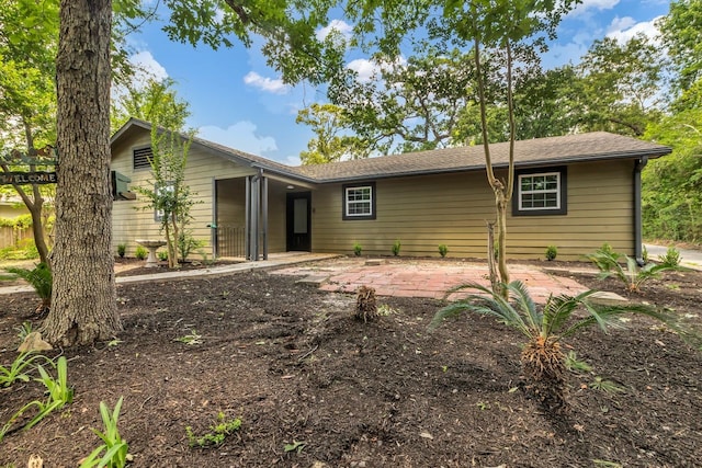 10650 Forest Creek Dr, Conroe, TX 77318 - view of front of property with a patio area