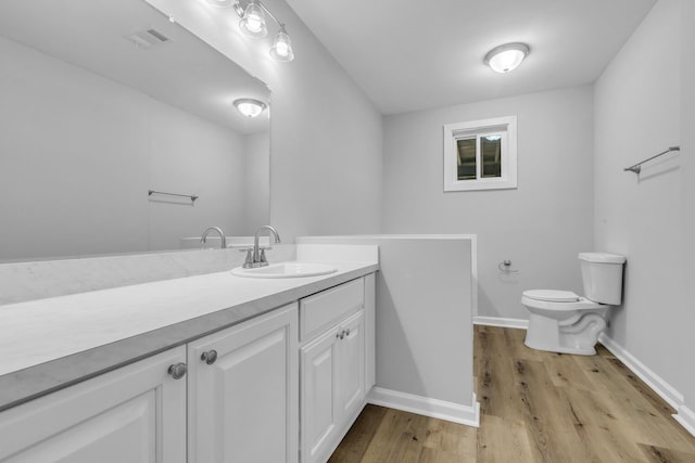 10650 Forest Creek Dr, Conroe, TX 77318 - bathroom featuring vanity and wood finished floors
