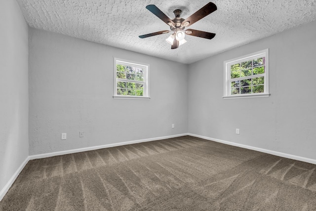 10650 Forest Creek Dr, Conroe, TX 77318 - unfurnished room featuring carpet floors, a textured ceiling, and a ceiling fan