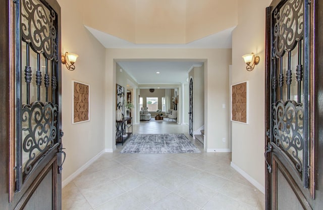 5719 Avon Landing Ln, Sugar Land, TX 77479 - entryway with light tile patterned flooring and baseboards