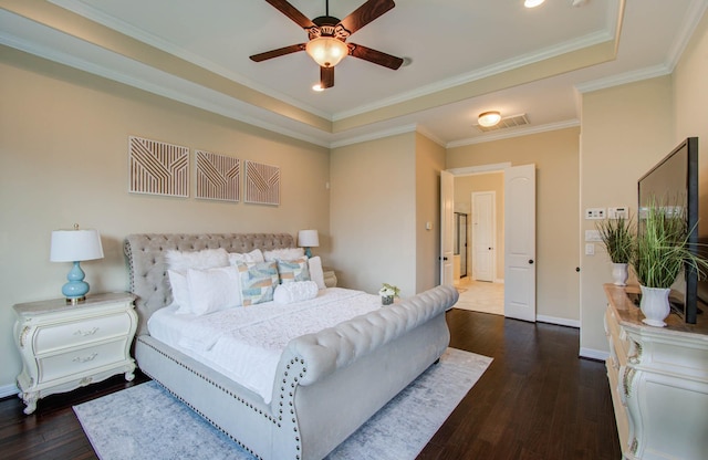 5719 Avon Landing Ln, Sugar Land, TX 77479 - bedroom with hardwood / wood-style floors, ornamental molding, ceiling fan, and a tray ceiling