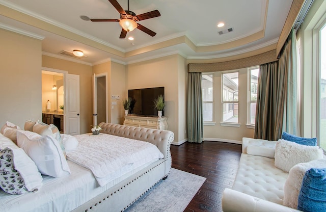 5719 Avon Landing Ln, Sugar Land, TX 77479 - bedroom with dark wood-type flooring, a tray ceiling, ornamental molding, connected bathroom, and a ceiling fan