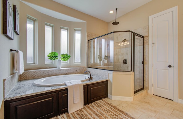 5719 Avon Landing Ln, Sugar Land, TX 77479 - bathroom featuring a shower stall and a garden tub