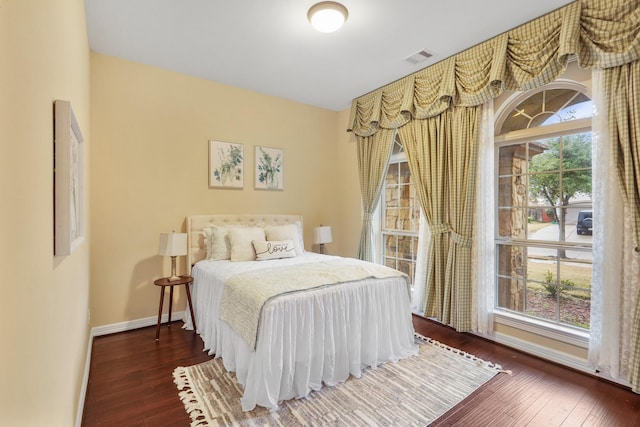 5719 Avon Landing Ln, Sugar Land, TX 77479 - bedroom with hardwood / wood-style floors and baseboards