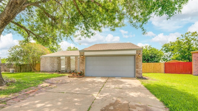 7502 Dawnbriar Ct, Houston, TX 77489 - view of front of house featuring driveway, an attached garage, and brick siding