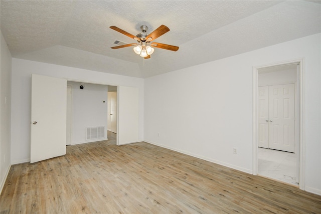 7502 Dawnbriar Ct, Houston, TX 77489 - spare room featuring ceiling fan, wood finished floors, and a textured ceiling