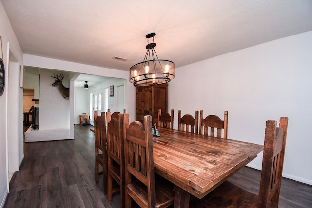 718 River Plantation Dr, Conroe, TX 77302 - dining room with a ceiling fan, a chandelier, and dark wood-style flooring