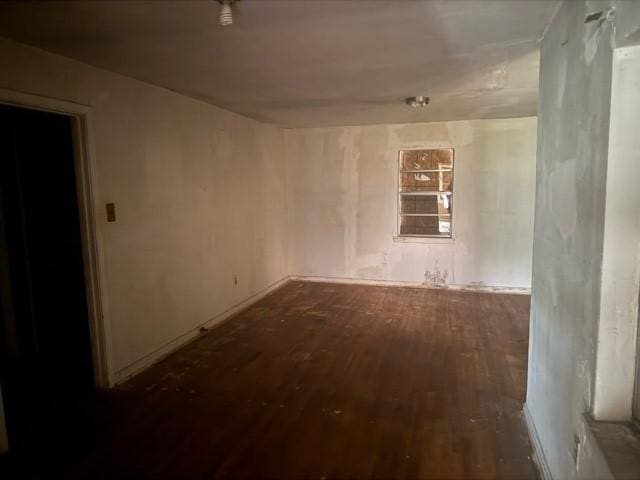 1053 Marjorie St, Houston, TX 77088 - spare room featuring dark wood-style flooring