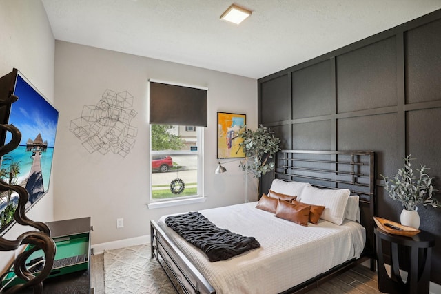 6019 Rivergrove Bend Dr, Humble, TX 77346 - bedroom featuring baseboards