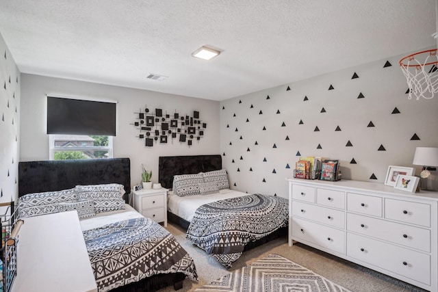 6019 Rivergrove Bend Dr, Humble, TX 77346 - bedroom featuring light carpet and a textured ceiling