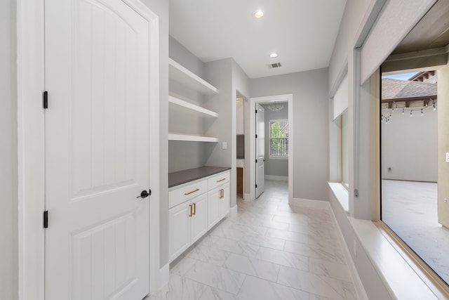 3971 Rolling Thicket Dr, Spring, TX 77386 - corridor with light marble finish flooring and recessed lighting