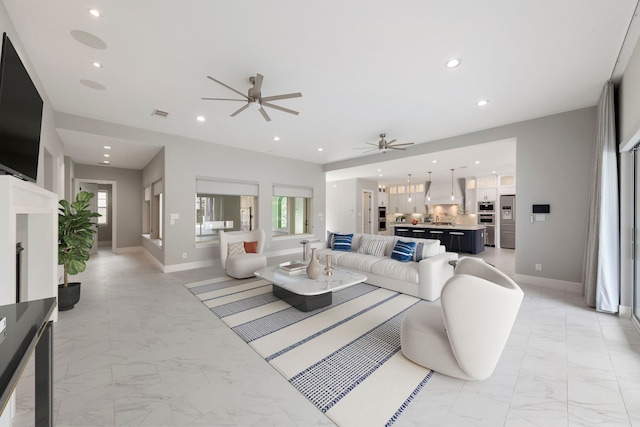 3971 Rolling Thicket Dr, Spring, TX 77386 - living area with light marble finish flooring, a ceiling fan, and recessed lighting