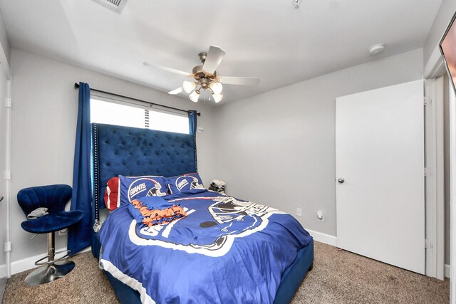 8710 Beverlyhill St Unit 201, Houston, TX 77063 - carpeted bedroom with ceiling fan and baseboards