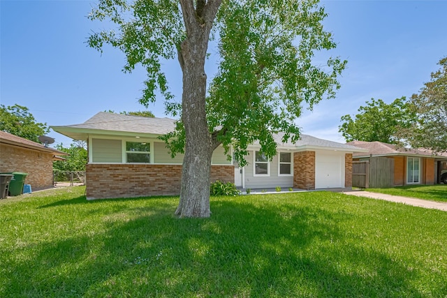 12210 Palmbeach St, Houston, TX 77034 - single story home featuring brick siding, an attached garage, and a front yard