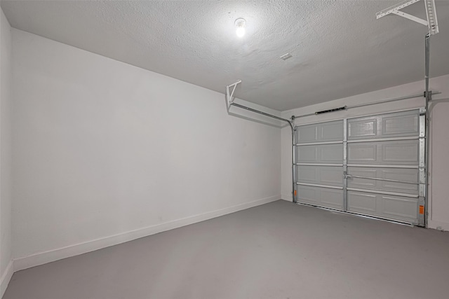 12210 Palmbeach St, Houston, TX 77034 - garage featuring baseboards