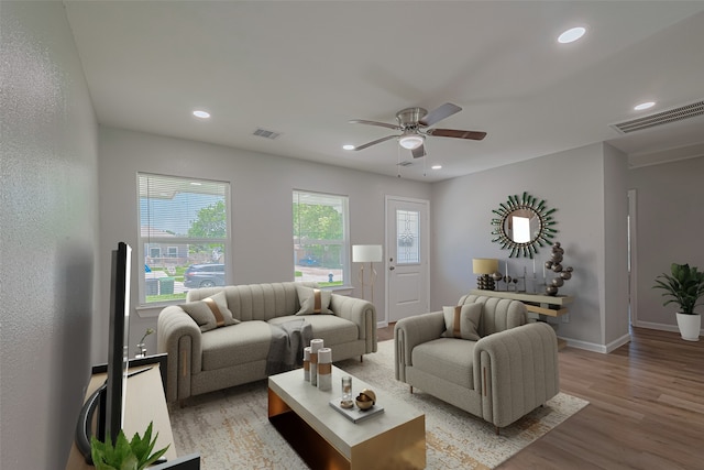 12210 Palmbeach St, Houston, TX 77034 - living room with light wood finished floors, a ceiling fan, and recessed lighting