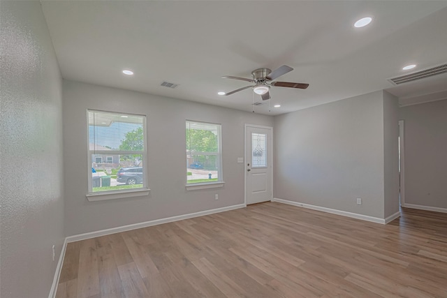 12210 Palmbeach St, Houston, TX 77034 - empty room featuring light wood-style flooring, a ceiling fan, and recessed lighting