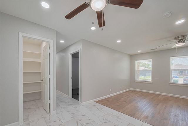 12210 Palmbeach St, Houston, TX 77034 - empty room with a ceiling fan, a smoke detector, light marble finish floors, and recessed lighting