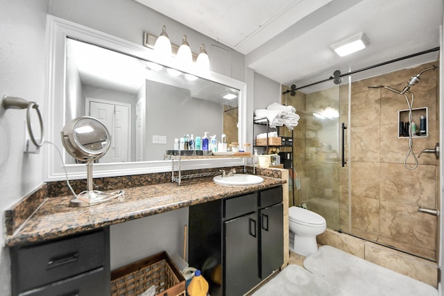 2100 Tanglewilde St Unit 312, Houston, TX 77063 - bathroom featuring a shower stall and vanity