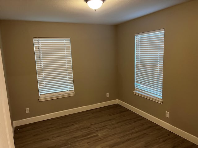 5105 Oak Ave, Pasadena, TX 77503 - empty room featuring dark wood-type flooring and baseboards