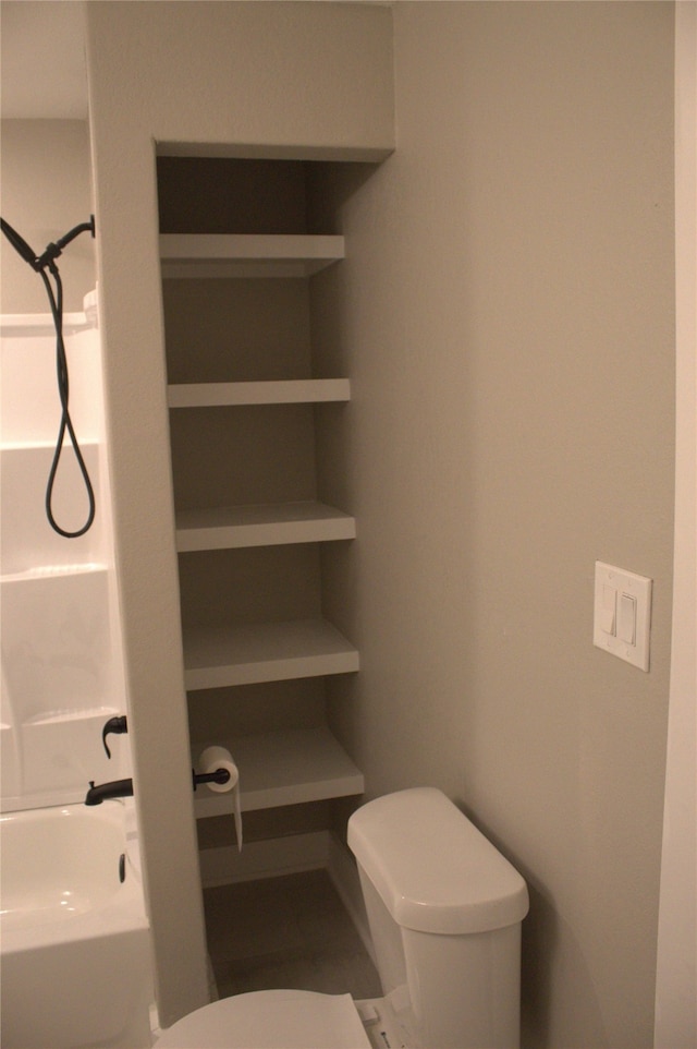 5105 Oak Ave, Pasadena, TX 77503 - bathroom with toilet and a shower