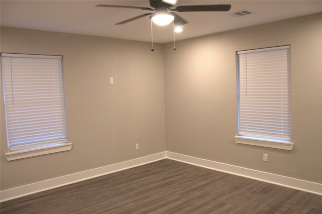 5105 Oak Ave, Pasadena, TX 77503 - spare room with dark wood-type flooring and ceiling fan