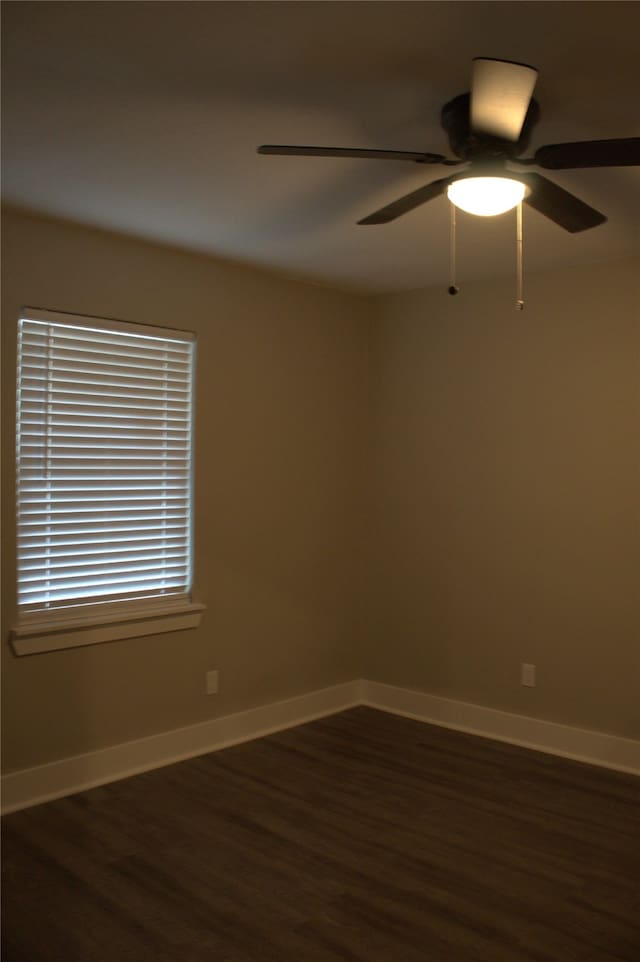 5105 Oak Ave, Pasadena, TX 77503 - spare room featuring dark wood-type flooring and a ceiling fan
