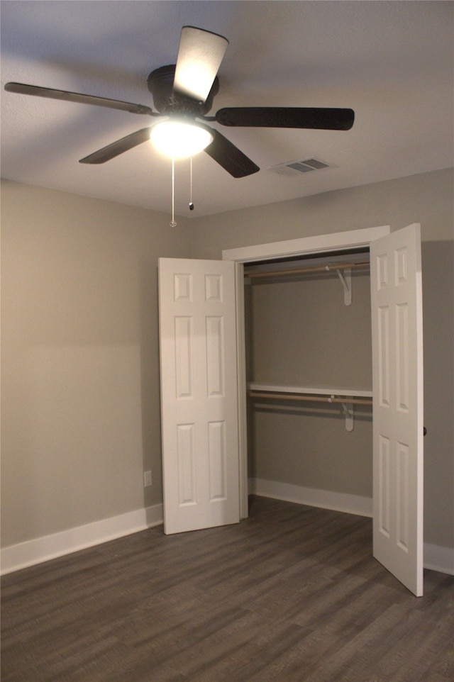 5105 Oak Ave, Pasadena, TX 77503 - unfurnished bedroom featuring dark wood-style flooring, a closet, and ceiling fan